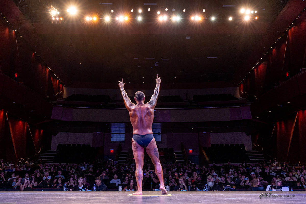 Dave Perez on stage after his 140-pound transformation